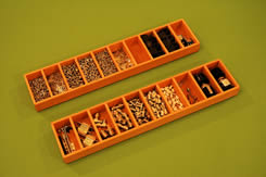 Parts Trays containing connectors. pins, screws, etc.